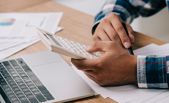 man with calculator