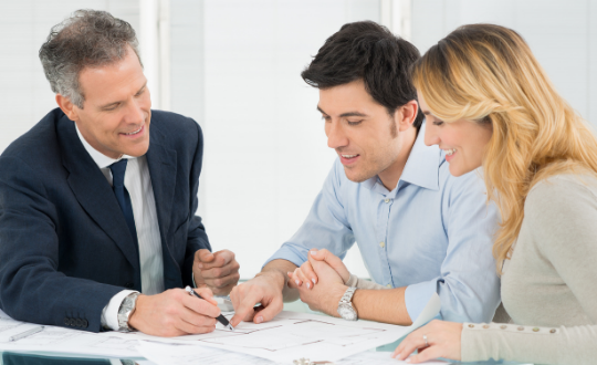 Couple receiving advice on offset mortgages from a broker